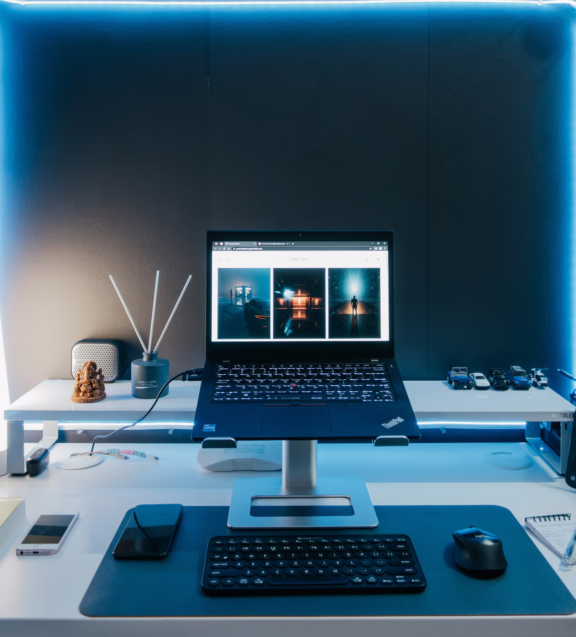 Developer working at a laptop in a modern workspace.
